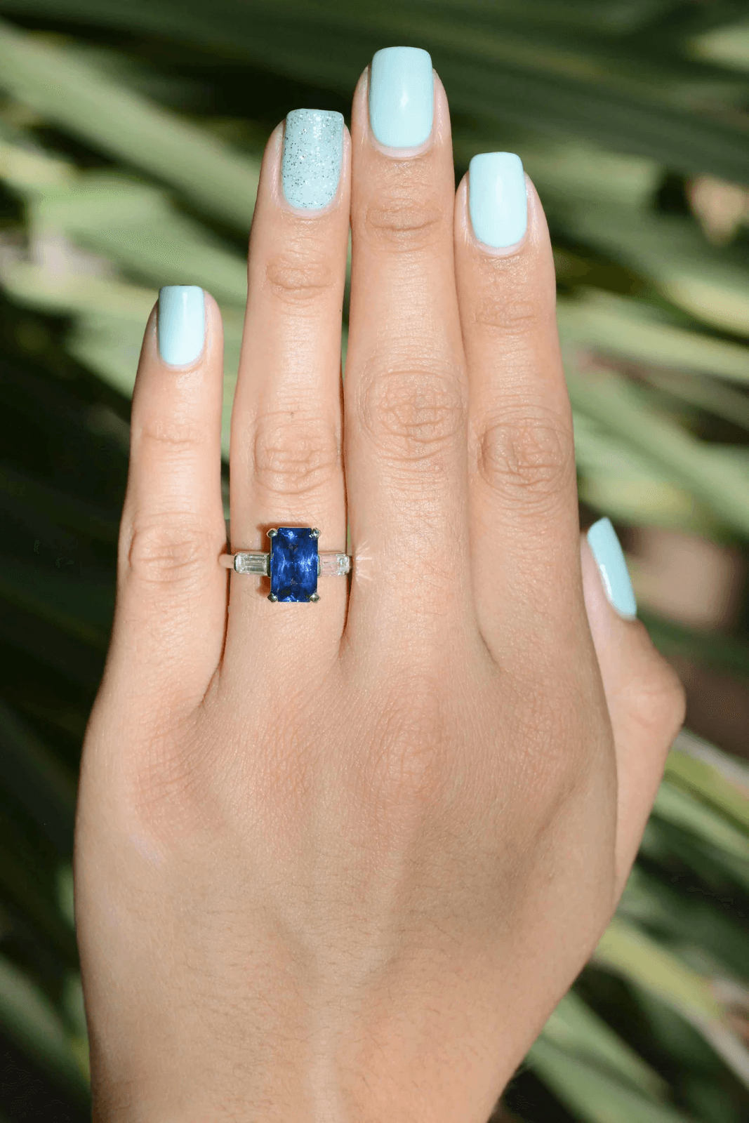 blue-sapphire-on-ring-finger